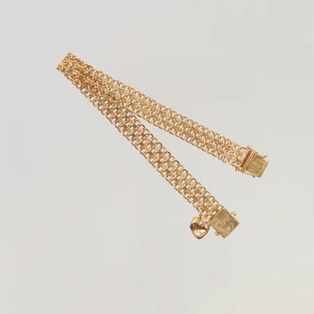 Armband x-länk 18,5cm bredd 9mm defekt berlock 18K 18,2g.