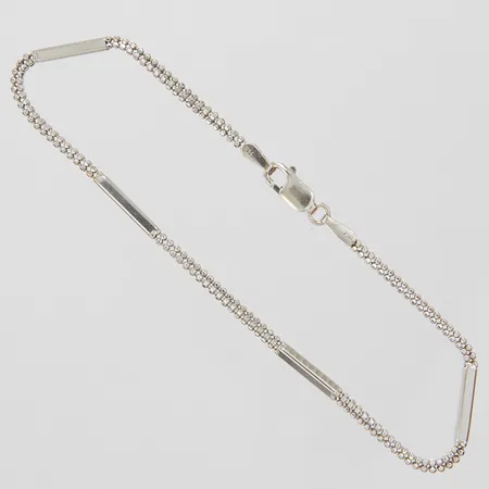 Armband skevt längd: 19,3cm, bredd: 1,8-2mm, vitguld, 18K Vikt: 3,8 g