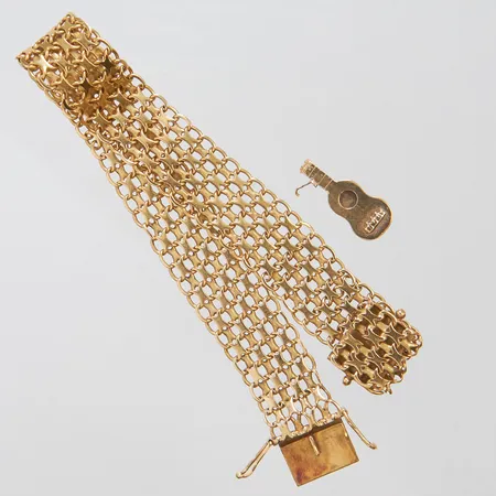 1 Armband 1 Berlock skadade 18K Vikt: 18,9 g