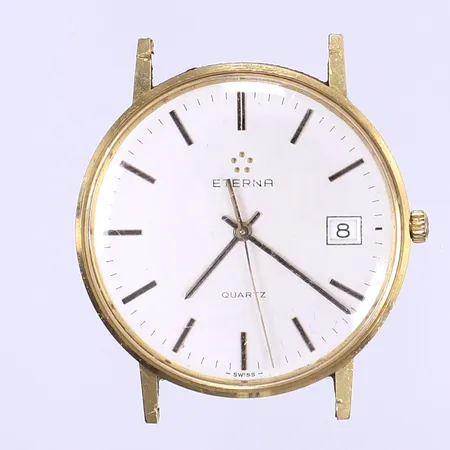 Herrur Eterna, Ø34mm, quartz, datum, defekt går ej, mycket sliten boett, sliten krona ej guld, boett 18K Bruttovikt: 22,7g