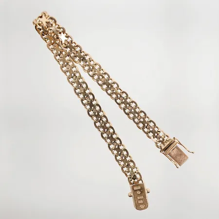 Armband x-länk med en defekt länk 19cm bredd 7mm 18k 14,4g Vikt: 14,4 g