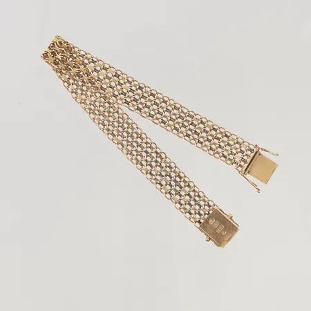 Armband x-länk 20,5cm bredd 12mm ojämnheter i länken 18K 16,5g.