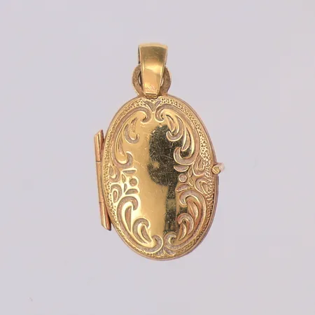 Hänge / Medaljong mönstrad längd 17mm bredd 10mm, 18K Vikt: 0,7 g