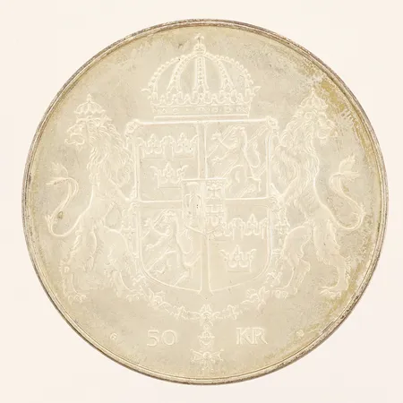 Minnesmynt Bröllopet mellan Konung Carl XVI Gustaf och Drottning Silvia, 19 juni 1976, 50kr, Ø36mm, 925/1000 silver Vikt: 27 g