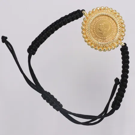 Armband mynt Attaturk 21,6K år 2024 Ø22mm ca 3,6gram, ram i gulmetall, snöre Vikt: 0 g