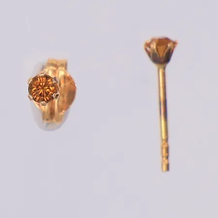 Örhängen bruna stenar ca Ø3mm, saknar en snurrebuss, 18K