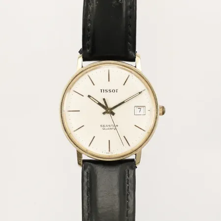 Herrur Tissot Seastar 14K, quartz 33,5mm går ej, repigt glas, bruksslitage på läderband