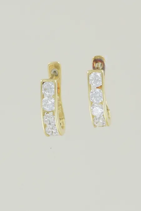 Ett par örhängen med stenar höjd 10 mm bredd 1,4 mm, 18K  Vikt: 1,2 g