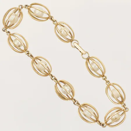 Armband med pärlor längd 20,5cm, bredd 11,2mm, skadade pärlor med hål, 18K  Vikt: 18,5 g