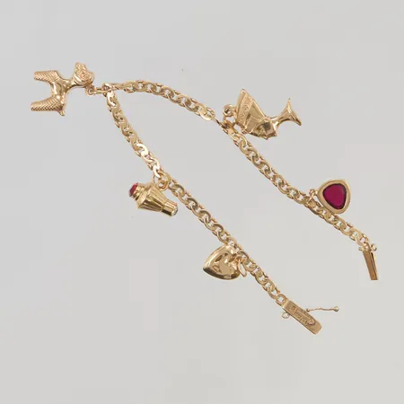 Armband 18,5cm bredd 3,5mm berlocker 18K 10,9g.
