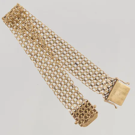 Armband x-länk 19cm bredd 15mm ojämnheter 18K 18,7g.