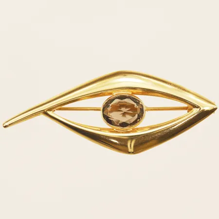 Brosch med rökkvarts, längd 51mm, bredd 20mm, 18K  Vikt: 3,4 g