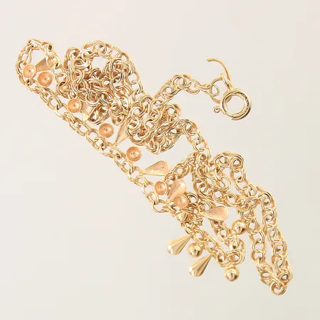 Collier med integrerade berlocker längd 44cm bredd 3-8mm, defekt 18K Vikt: 6,4 g