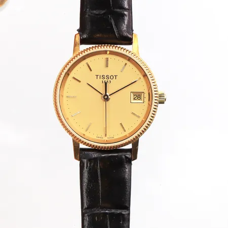 Damur Tissot 18K, 24mm, quartz, gravyr, läderband, etui. 