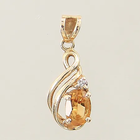 Hänge med orange sten samt diamant 1x ca 0,01ct 15x6,4mm 14K Vikt: 0,9 g