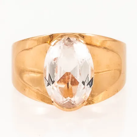 Ring med vit sten stl:17½ bredd 3,5-12,5mm, naggade fasetter, fåtal ojämnheter, 18K 3,2g. 