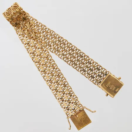 Armband X-Länk med stav längd 19cm, bredd 12,5mm, svenska stämplar, 18K Vikt: 20,3g Vikt: 20,3 g