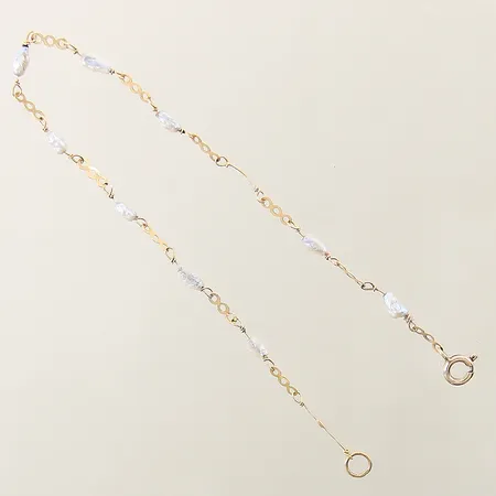 Armband defekt pärlor saknas 18K Vikt: 0,9 g