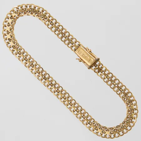 Armband X-länk längd: 19cm, bredd: 5,8mm, svenska stämplar, 18K Vikt: 7,9 g