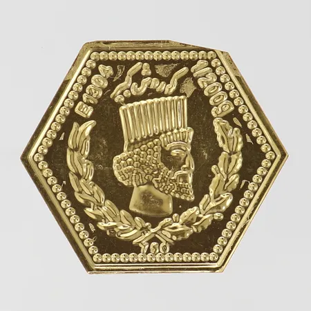 Tacka Iran 29x34mm bruten förpackning 18K.  Vikt: 1,1 g