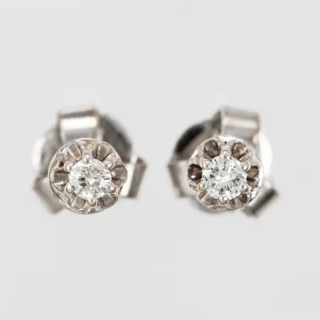 Ett par örhängen med diamanter ca 2x0,04ct, Ø ca 2mm, vitguld, 18K Vikt: 1 g