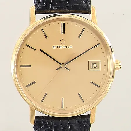 Herrur Eterna 18K quartz Ø33,5mm numrerad: 4100.68 datum läderband original med smärre slitage behov av batteribyte etui 