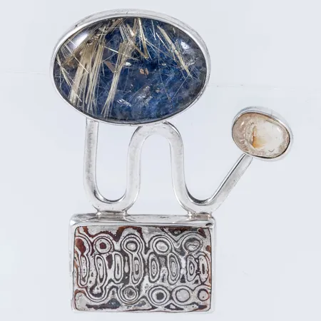 Brosch med rutilkvarts och lapis lazuli 35x46mm, silver Mokume-Gane 925/1000 16,3g. 
