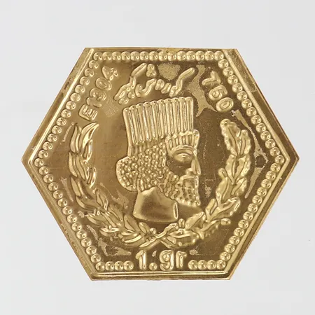 Tacka Iran 29x34mm bruten förpackning 18K.  Vikt: 1,1 g