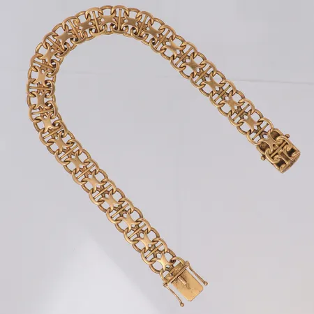 Armband x-länk längd 21,5cm bredd 10,6mm 18K Vikt: 29,8 g