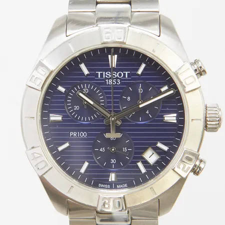 Herrur Tissot PR100 stål quartz 43mm, blå urtavla, kronograf, T101617A, snr T29GRA6MP, stållänk, viklås, mindre repor på länkar, inga tillbehör.