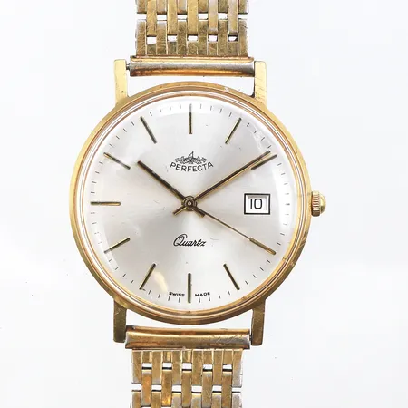Herrur Perfecta 18K, 33,5mm, quartz, gravyr, batteribyte krävs, klockarmband i oädel metall, etui, inga övriga tillbehör.