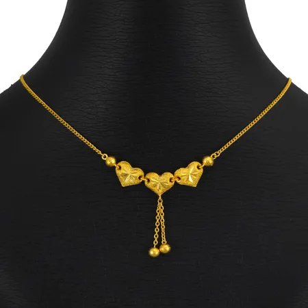 Collier, 23K guld - 965/1000, total längd 43,5 cm, kedjans bredd 1,3 mm, integrerade Hjärtan och klot - längd 40 mm, fint skick, en minimal ojämnhet i pansarkedjan, fint skick, ½ baht Vikt: 7,6 g