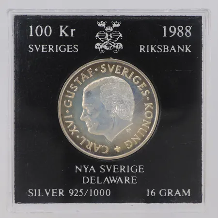 Minnesmynt 100kr Nya Sverige Delaware år 1988, plastetui, 925/1000 silver Vikt: 16 g