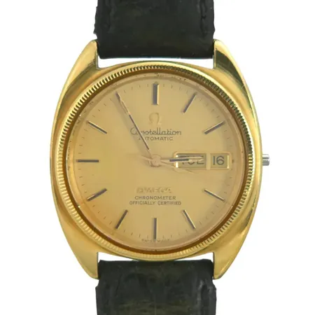 Herrur Omega Constellation, guld/stål, Ø35,5 mm, automatisk - tickar, kaliber 1021, chronometer, referensnummer CD168.0057, krona saknas, universal skinnband med slitage