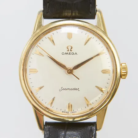 Herrur Omega Seamaster guld på stål 35mm, boettnr: 14390-2sc verknr: 17895514, cal. 285, läderarmband ej original, inga tillbehör