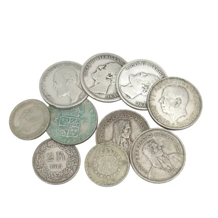 Parti svenska silvermynt, 3 utrikiska, 40-83 %, finvikt cirka 94g Vikt: 94 g