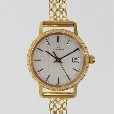 Damur Eterna 18K quartz Ø24mm X-länk i 18K längd 19cm ink boett, gravyr, går ej 18K. 