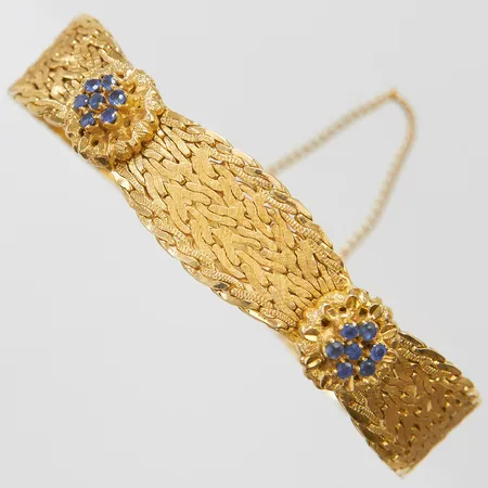 Armband med safirer, längd ca 18cm, bredd 13mm, säkerhetskedja, italienska stämplar, 18K Vikt: 39,6g Vikt: 39,6 g