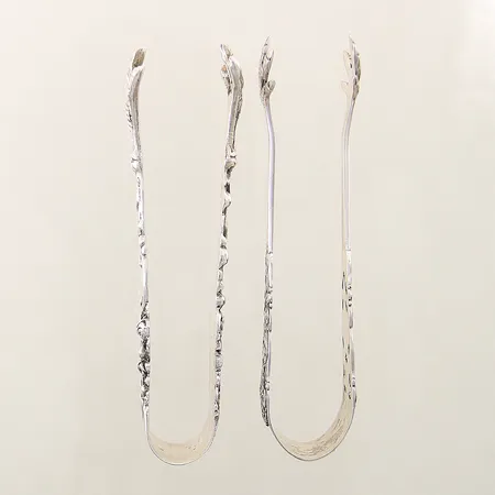 2 Sockertänger längd 9cm svenska importstämplar silver 830/1000 Vikt: 33,7 g