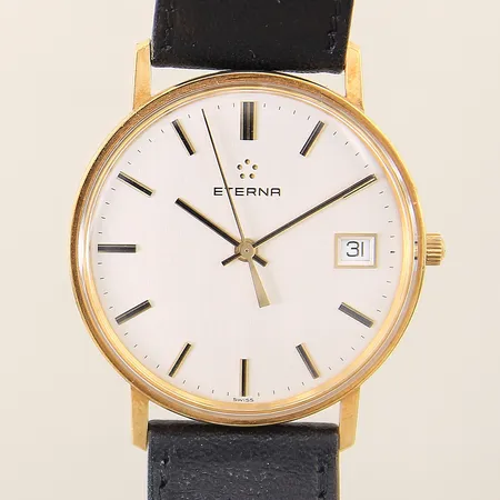 Herrur Eterna 18K quartz Ø34mm numrerad: 58.214.68 datum läderband original behov av batteribyte gravyr inga tillbehör 