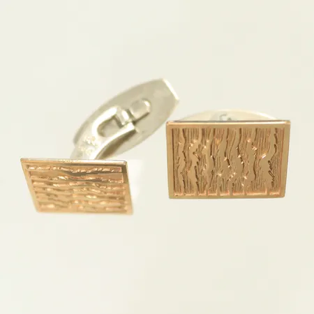 Ett par manschettknappar 15x17mm, delvis förgyllt, silver 830/1000-delar 6,7g 