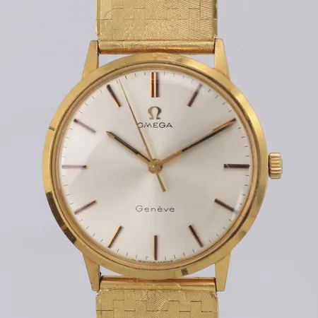 Herrur Omega Geneve Ø32,9mm, gravyr år 1970, urarmband 18K. Bruttovikt 71,0g, originalask skadad 