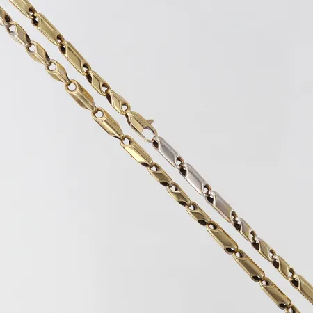 Kedja längd 65cm bredd 4mm ihålig tvåfärgat 18K.  Vikt: 18,3 g