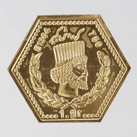 Tacka Iran 29x34mm bruten förpackning 18K.  Vikt: 1,1 g