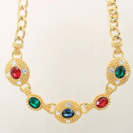 Collier med färgade stenar Swarovski längd 38cm bredd 10-25mm gulmetall