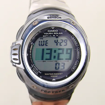 Herrur Casio Pro Trek PRG-1001T stål digital ref-nr:3022 serie-nr:202A334F mineralglas Ø42mm titanlänk, repig boett samt länk, inga tillbehör