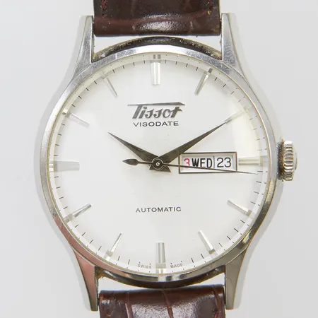 Herrur Tissot Visodate stål automat 40mm, refnr T019430B, serienr 10BC1258934, glasbaksida, dag, datum, läderarmband slitage, inga tillbehör.
