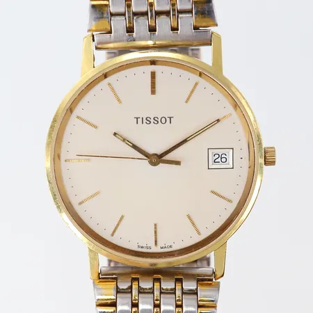 Herrur Tissot 18K quartz Ø34mm länk i stål gravyr 18K. 