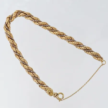 Armband cordell tvåfärgad längd ca 20,5cm, bredd 6,2mm säkerhetskedja 18K Vikt: 18,2 g