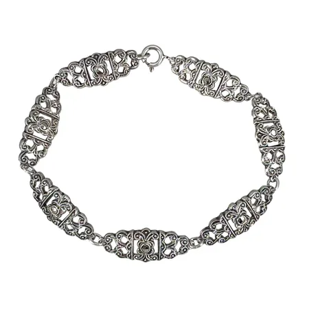 Vintage Armband silver 830/1000, Markasiter (samtliga i behåll), längd 19 cm, bredd 9,5 mm, svensk kontroll/importstämpel  Vikt: 9,2 g